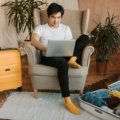 Happy traveler booking flights and hotels online with an easy-to-use travel platform