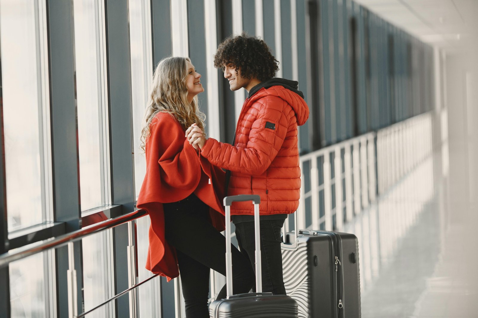 Travelers with luggage at Denver International Airport preparing for a hassle-free vacation with travel packages