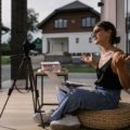 Travel influencer creating content at an exotic location representing ambassador travel benefits and experiences