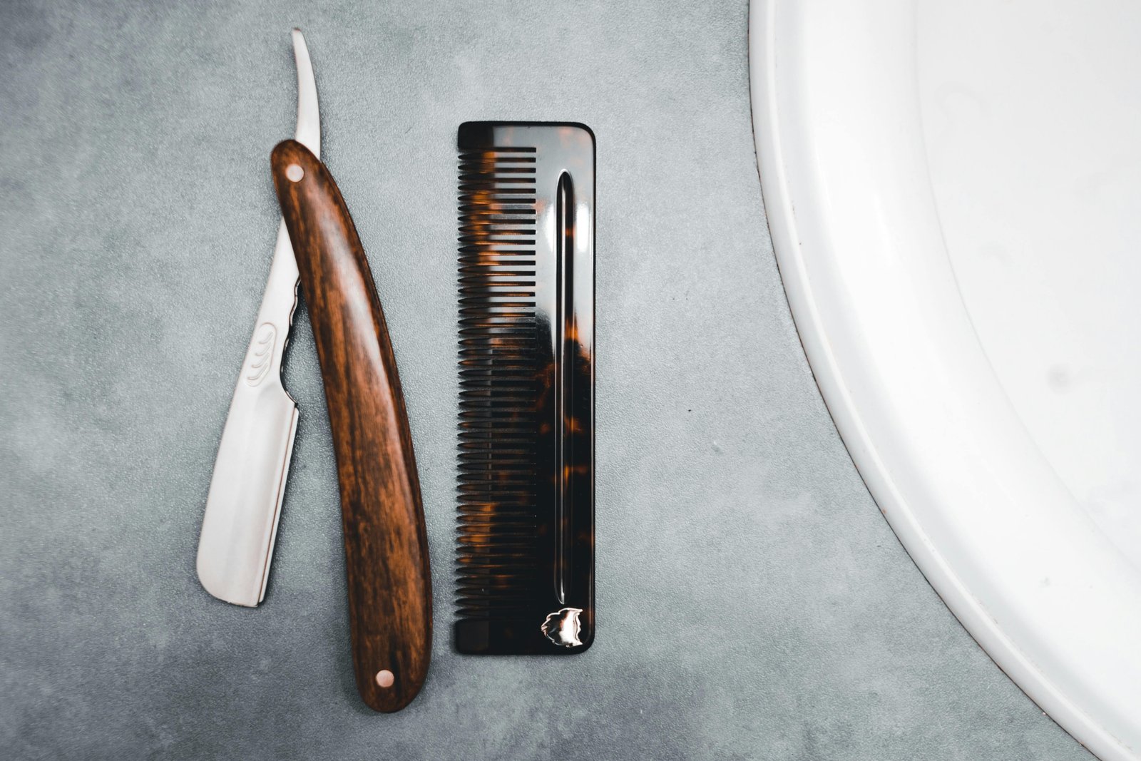 Compact travel razor and grooming kit neatly packed in a toiletry bag for easy and convenient shaving on the go