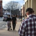 job seekers networking and searching for employment opportunities in a small vibrant town setting
