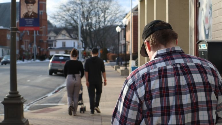 job seekers networking and searching for employment opportunities in a small vibrant town setting