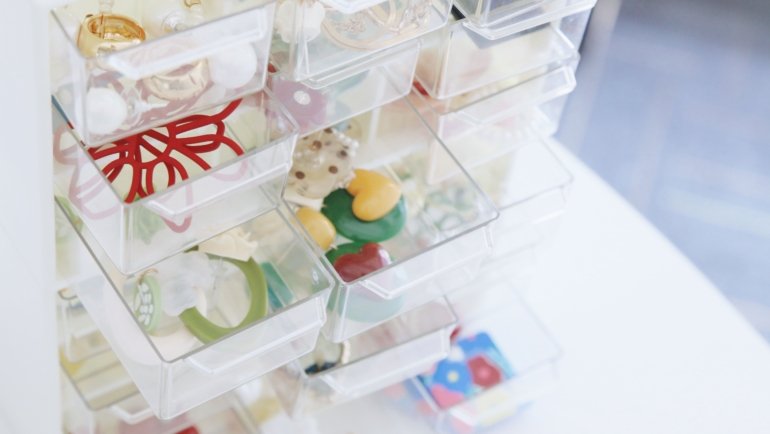 Organized travel jewelry with necklaces stored safely to prevent tangling and damage