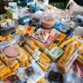 Portable travel snacks including trail mix, granola bars, nuts, and jerky ideal for hiking and outdoor trips