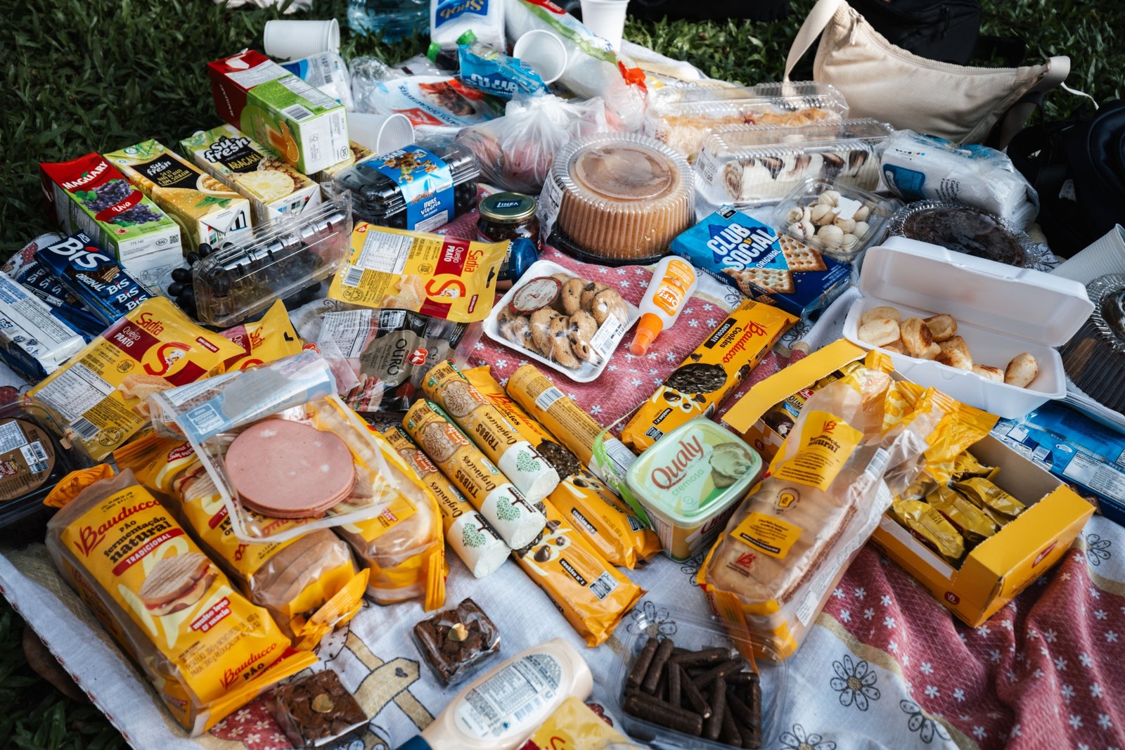 Portable travel snacks including trail mix, granola bars, nuts, and jerky ideal for hiking and outdoor trips