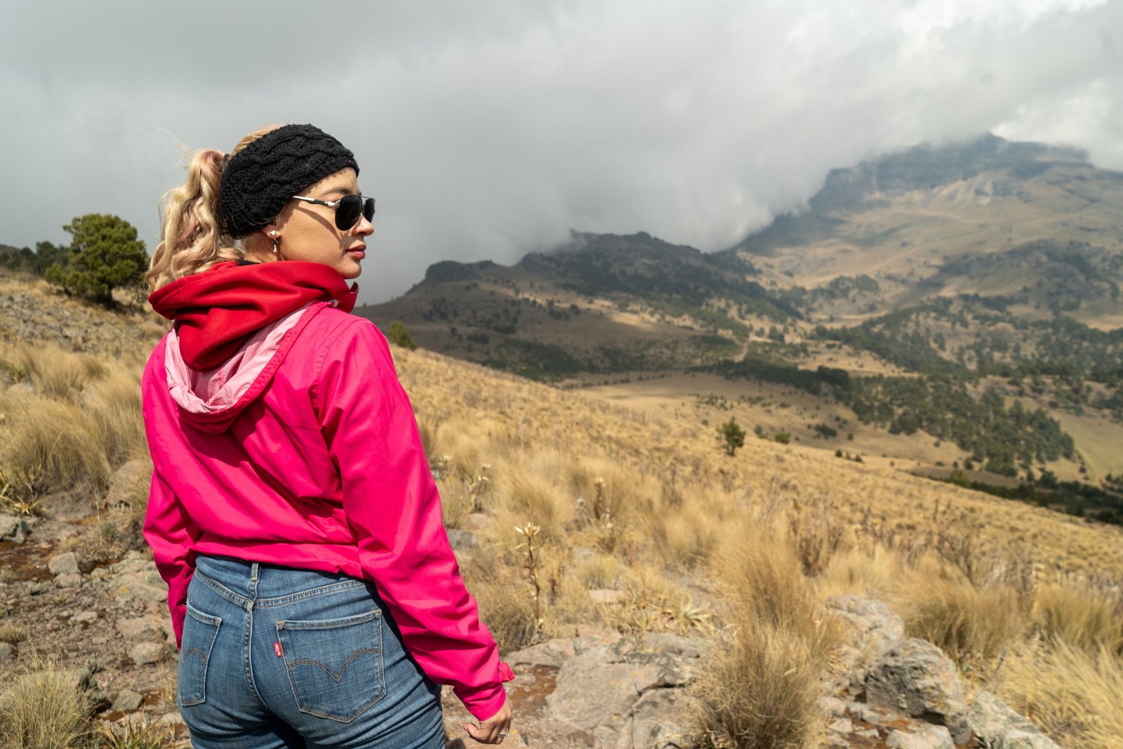 Traveler wearing a durable fake wedding band made of silicone during outdoor adventure