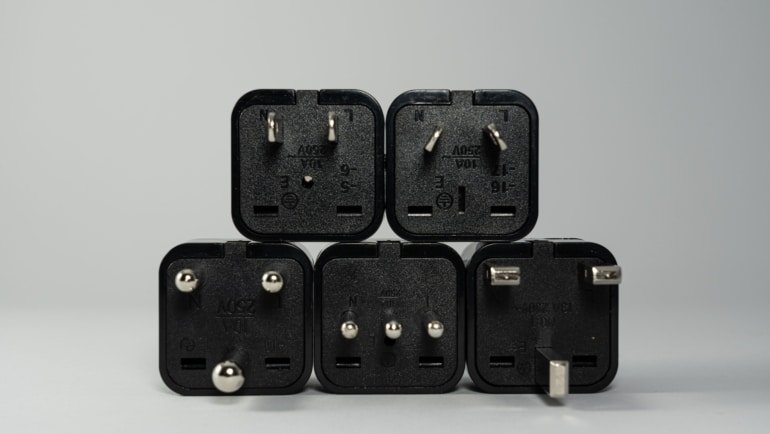 Travel plug adapters compatible with Portugal Type C and F sockets for safe and convenient charging