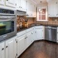 High-quality wooden travel trailer cabinet doors inside a cozy RV interior
