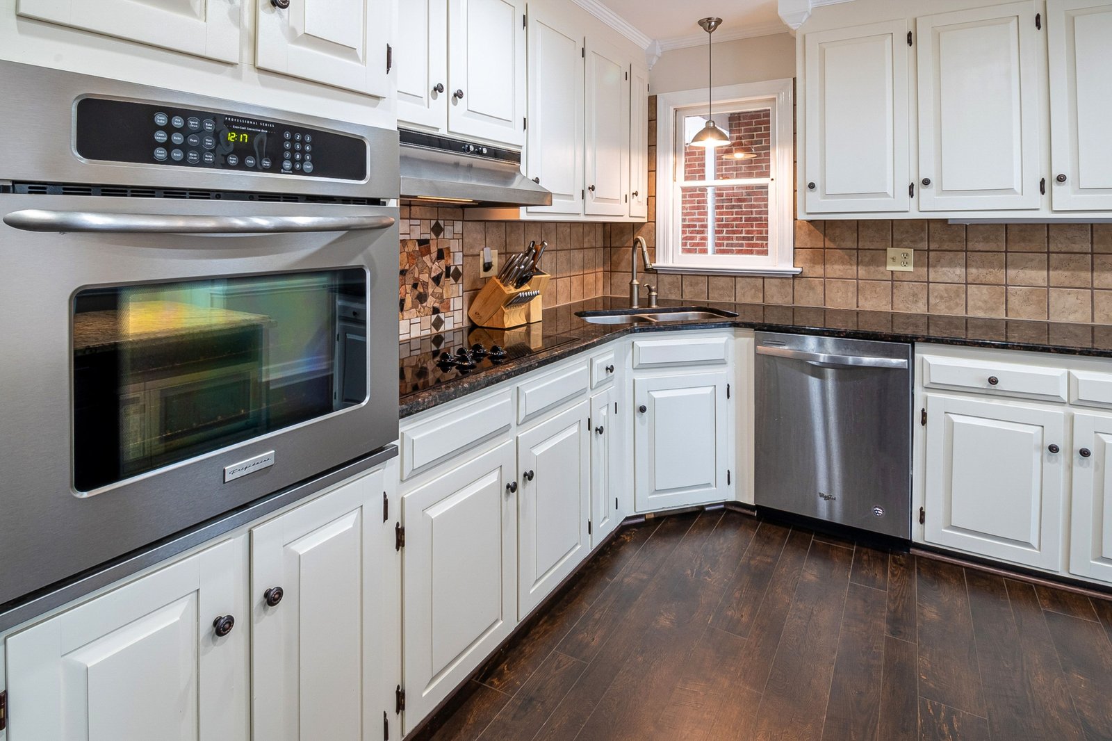 High-quality wooden travel trailer cabinet doors inside a cozy RV interior