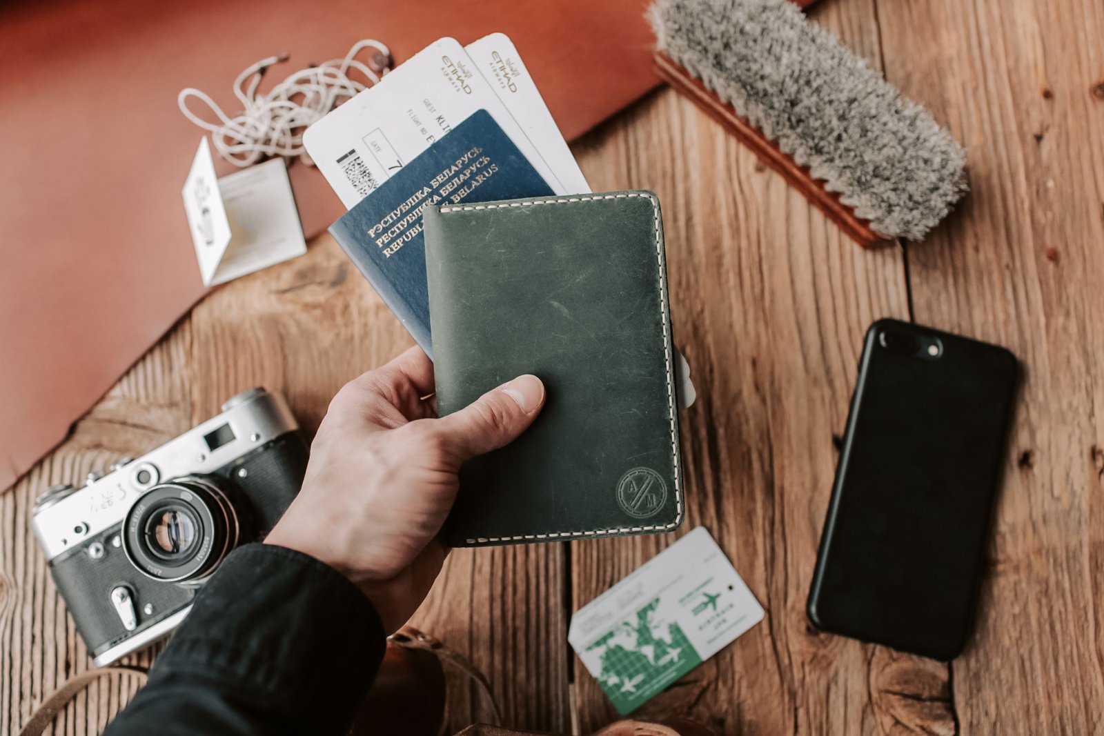 Organized travel documents holder with passport, boarding passes, and cards ready for a hassle-free journey