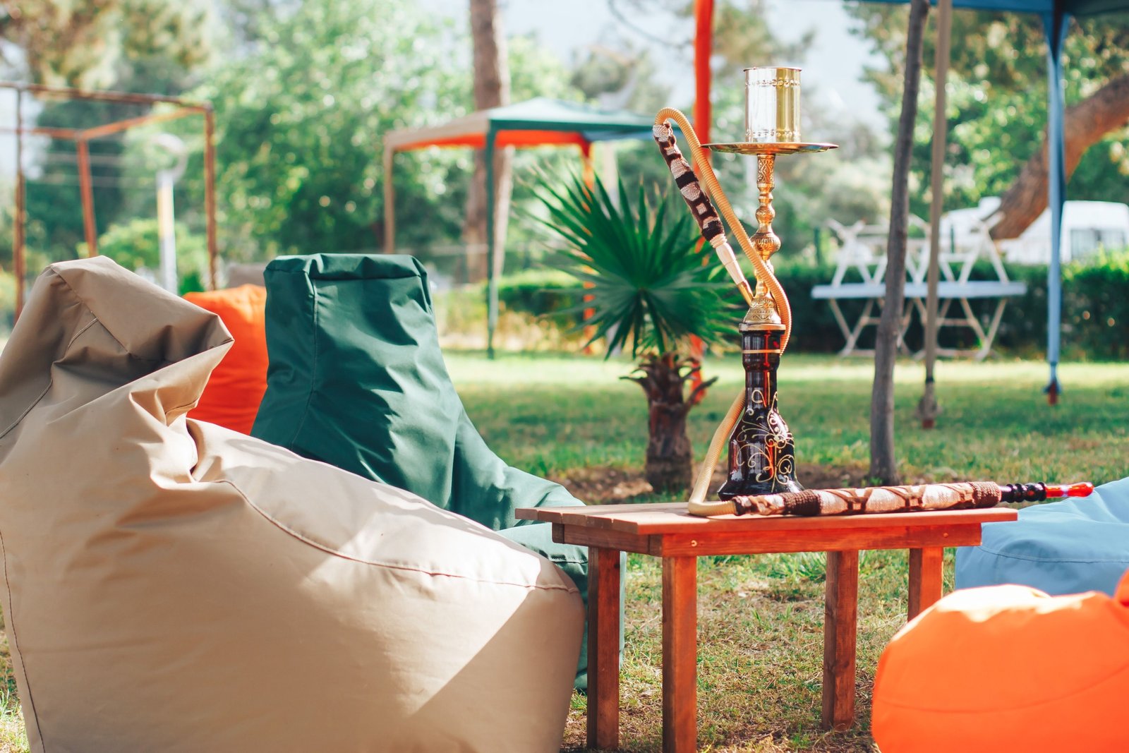 Compact and portable travel hookah set up outdoors for easy social smoking during travel and camping