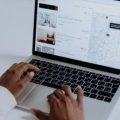 Person booking travel online using travel reservation booking technology for fast and efficient trip planning