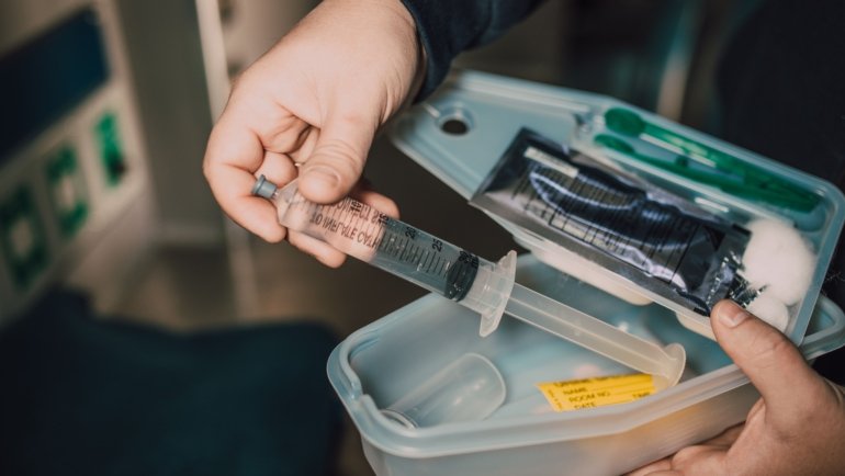 Portable travel sharps container for safe disposal of needles and medical waste during trips