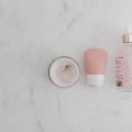 Rodan and Fields travel size skincare products arranged with travel accessories for convenient skincare routine on the go