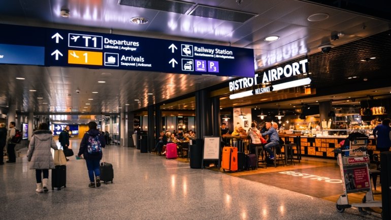 O'Hare Oasis Travel Plaza modern rest area with travelers dining and relaxing near Chicago airport