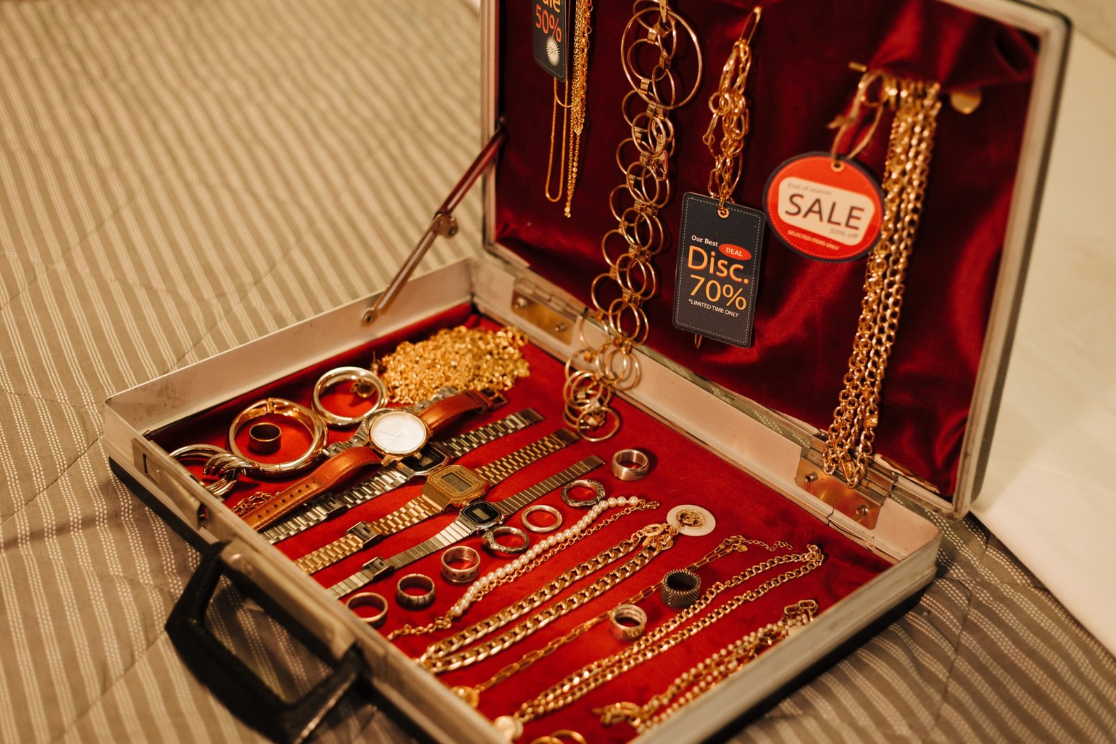 Large jewelry travel case open with organized compartments containing necklaces, rings, and bracelets for secure and convenient travel