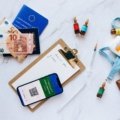 Traveler preparing important documents, health kit, and essentials for safe and well-organized international travel