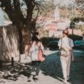 Woman wearing stylish and comfortable walking shoes exploring a European city street