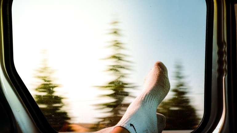 Close-up of comfortable travel socks on feet during outdoor adventure highlighting cushioning and moisture-wicking features