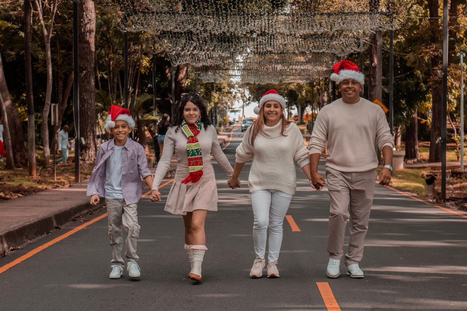 Joyful family enjoying Christmas travel holiday with suitcases and festive decorations, celebrating vacation and holiday deals in 2026