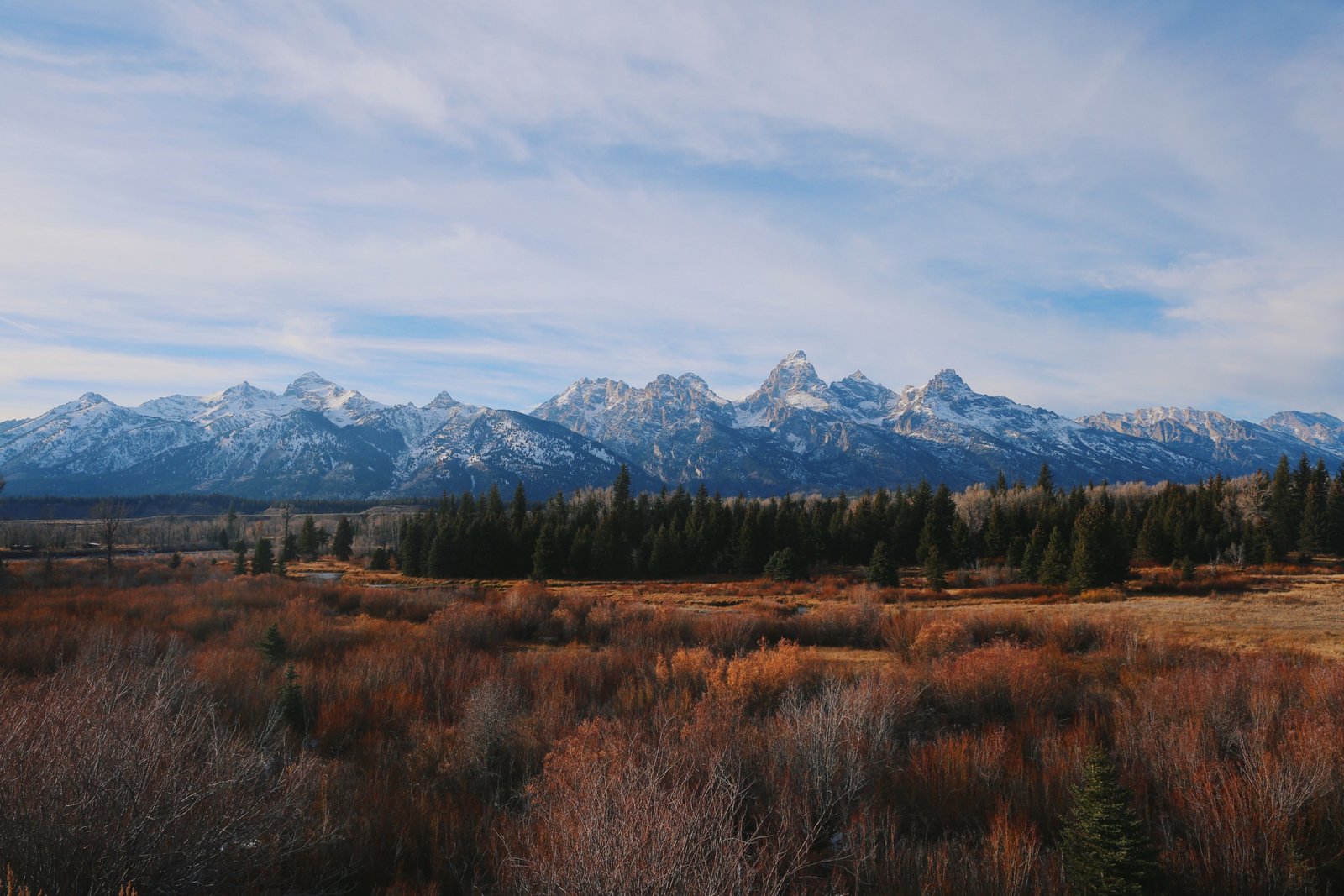 Scenic American West national park with red rock formations and expansive sky, perfect for outdoor travel and adventure in 2026