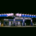 Cherokee Travel Plaza highway rest stop with fuel station, food outlets, and parking area for travelers