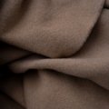 Elegant cashmere travel blanket providing warmth and comfort on a stylish journey