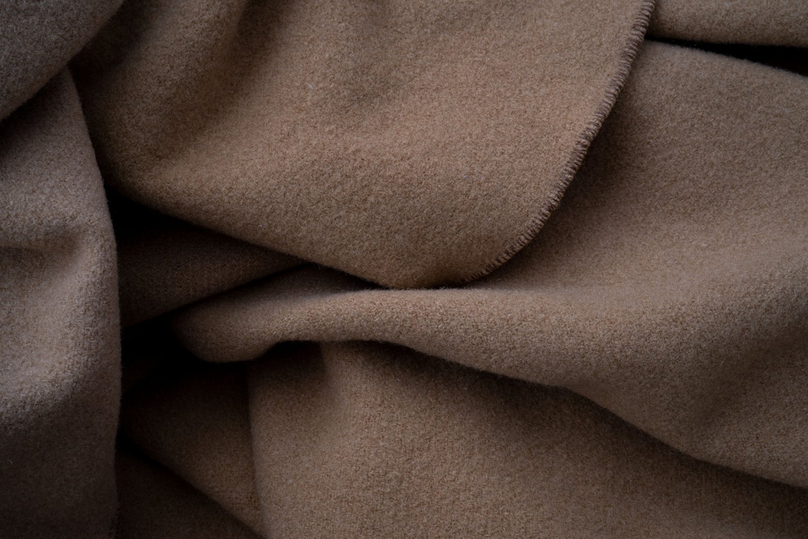 Elegant cashmere travel blanket providing warmth and comfort on a stylish journey
