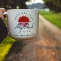 Disney coffee travel mug with iconic characters keeping beverage warm during travel or outdoor activities