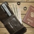 Organized travel wallet with passport, credit cards, and cash ready for secure and stylish travel