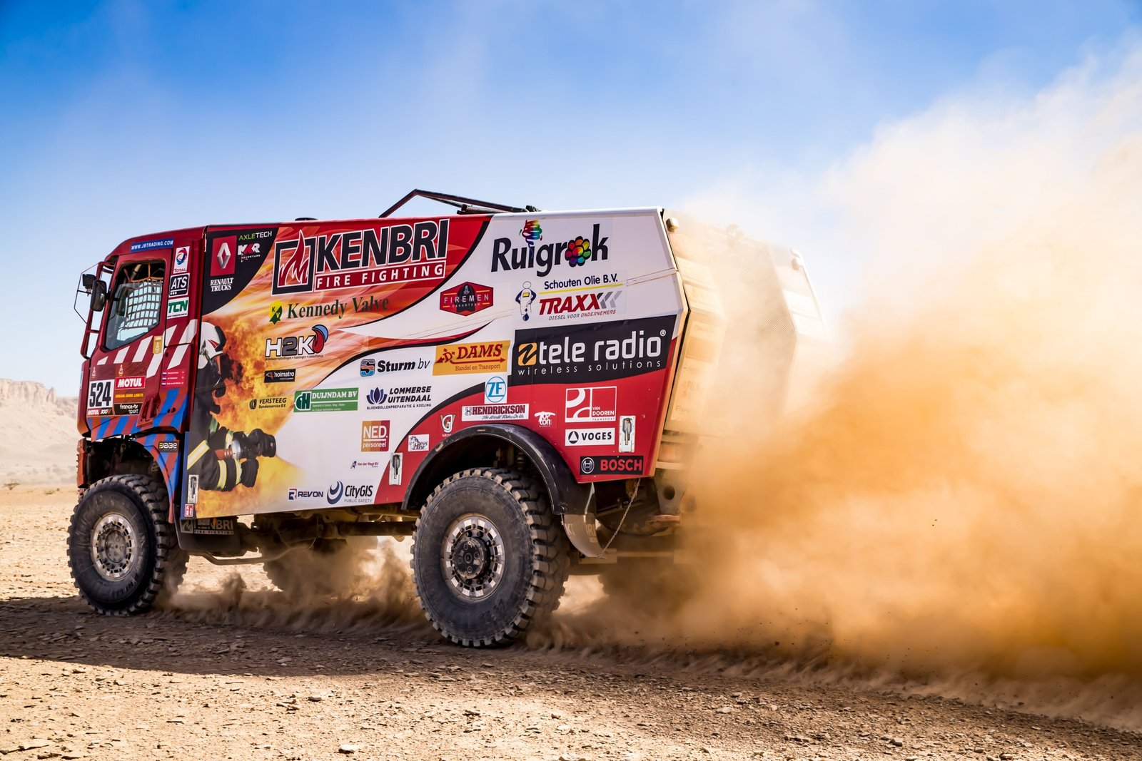 Chevy Colorado ZR2 with long travel DSSV suspension driving on rocky off-road trail