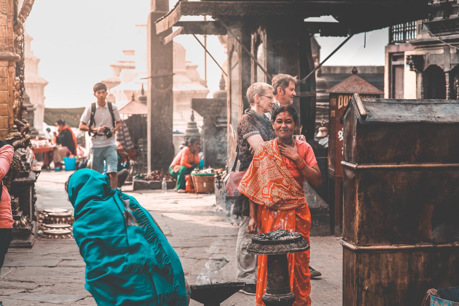 Respectful traveler interacting with locals while exploring cultural traditions responsibly