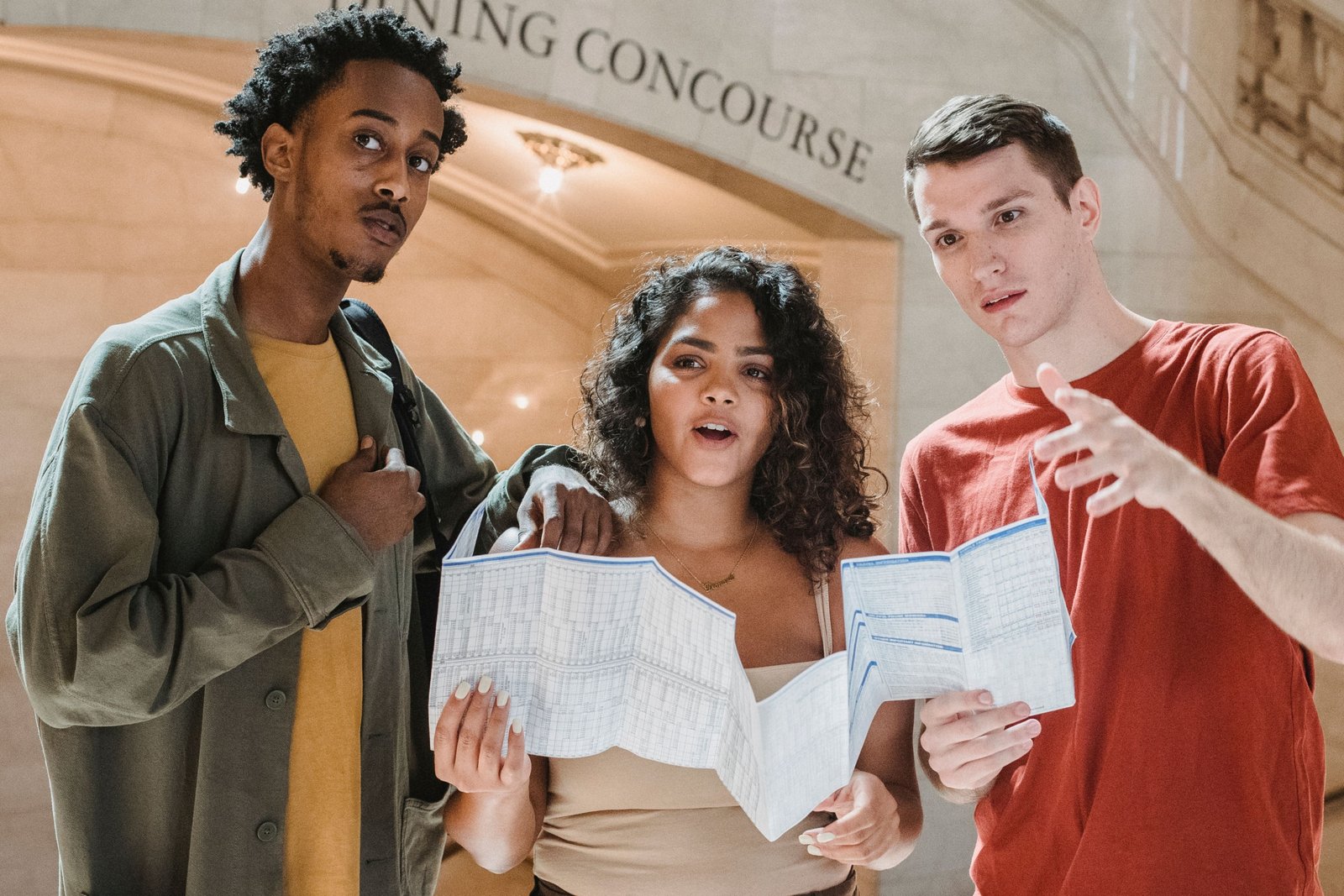 Young travel host guiding students in a vibrant city, sharing budget-friendly travel tips and cultural insights