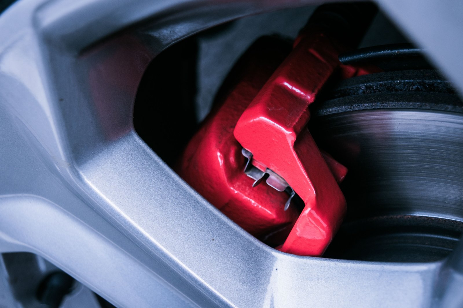 Close-up of electric drum brake system on a travel trailer showing brake components for safe towing