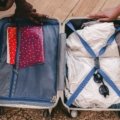 Dirty clothes travel bag inside suitcase keeping dirty and clean clothes organized during travel