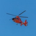 Helicopter flying fast in clear sky representing speed and advanced aviation technology