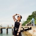 Woman wearing a comfortable and stylish travel dress with sleeves outdoors, combining elegance and practicality for travel