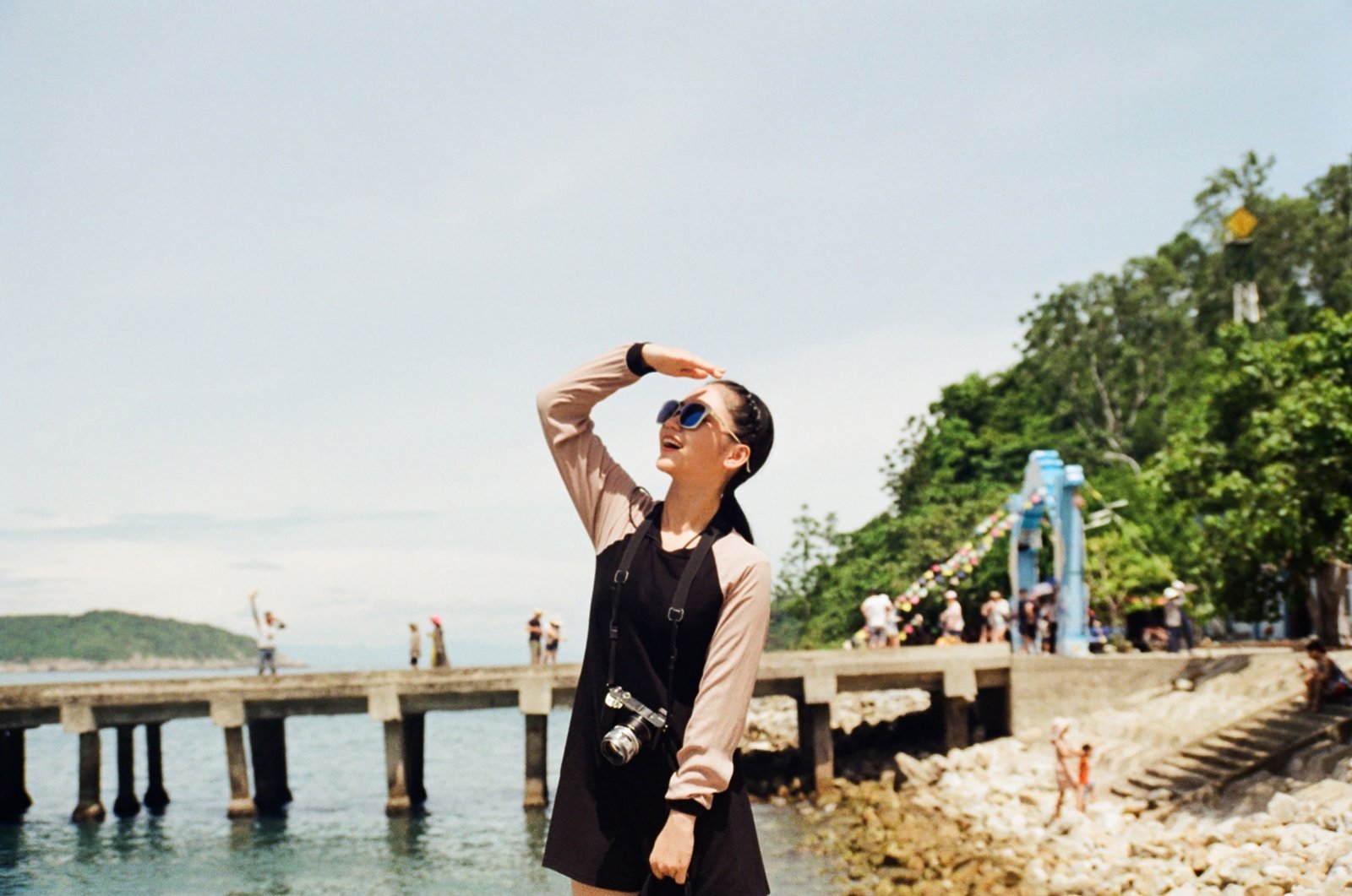 Woman wearing a comfortable and stylish travel dress with sleeves outdoors, combining elegance and practicality for travel