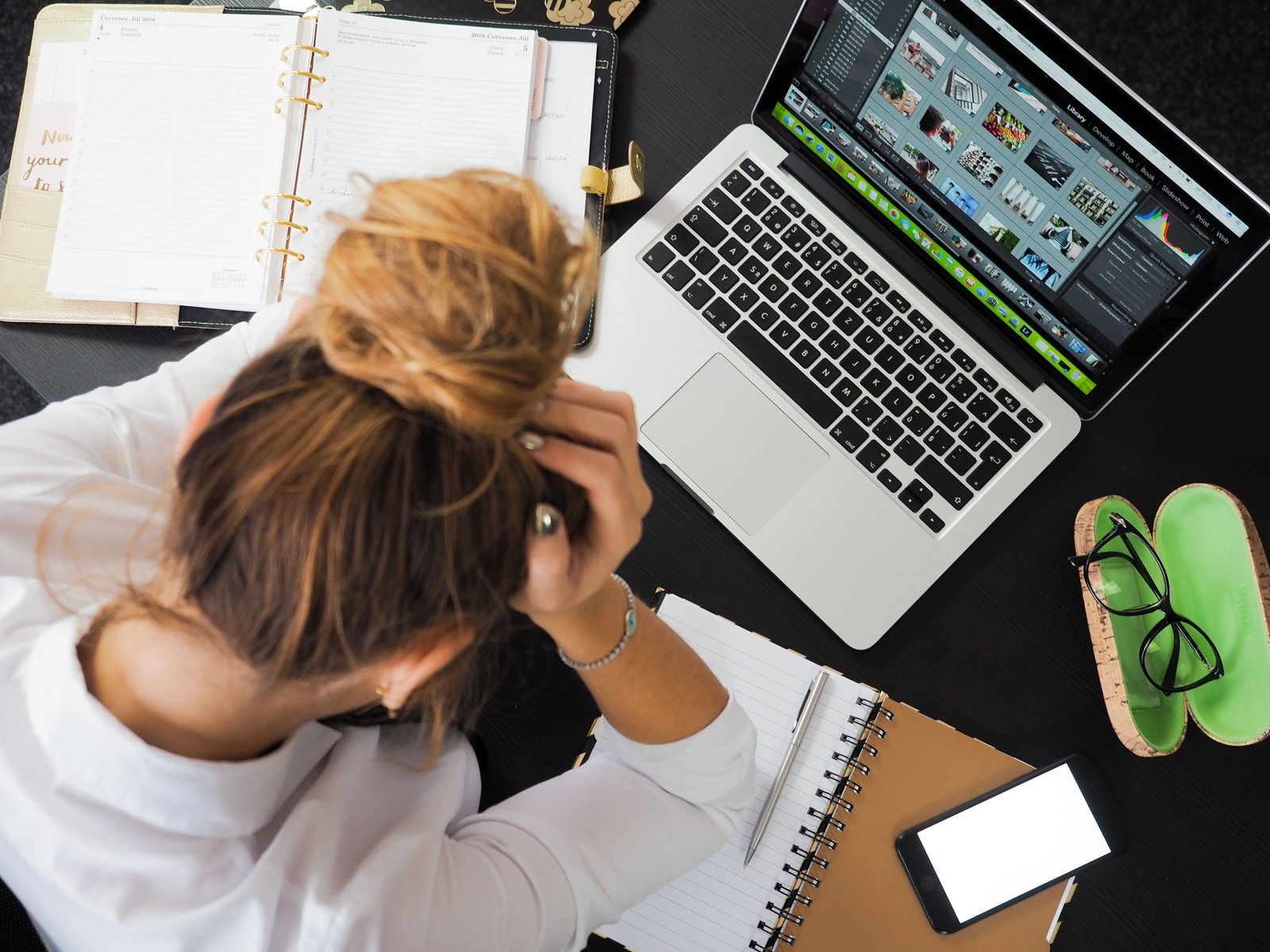 Frustrated person troubleshooting software issue on computer to fix EndNote export dialog problem