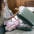 Traveler packing lightweight travel clothes for versatile and comfortable adventures