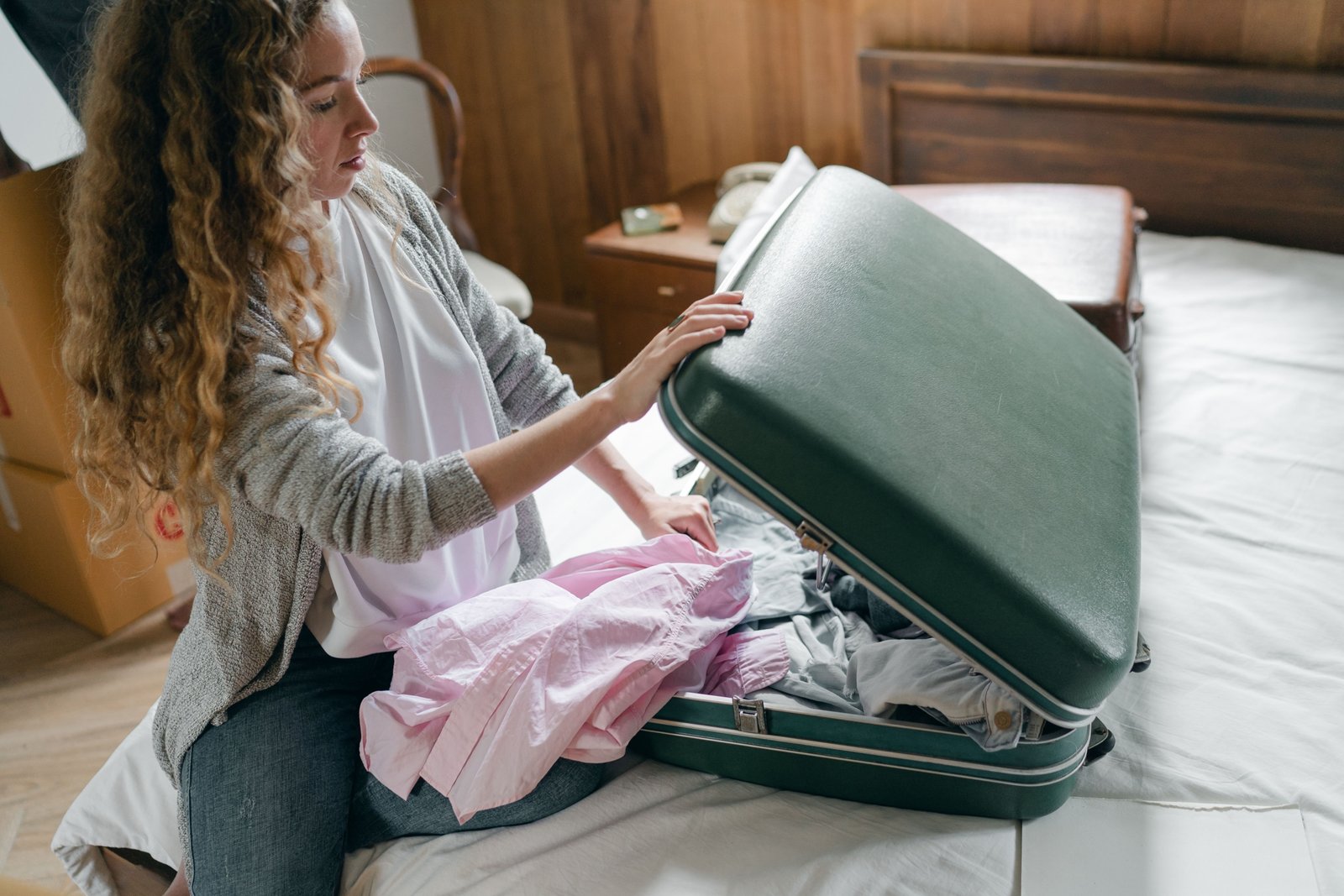 Traveler packing lightweight travel clothes for versatile and comfortable adventures