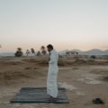 Portable travel prayer mat for Muslim prayer outdoors showing convenience and spiritual practice while traveling