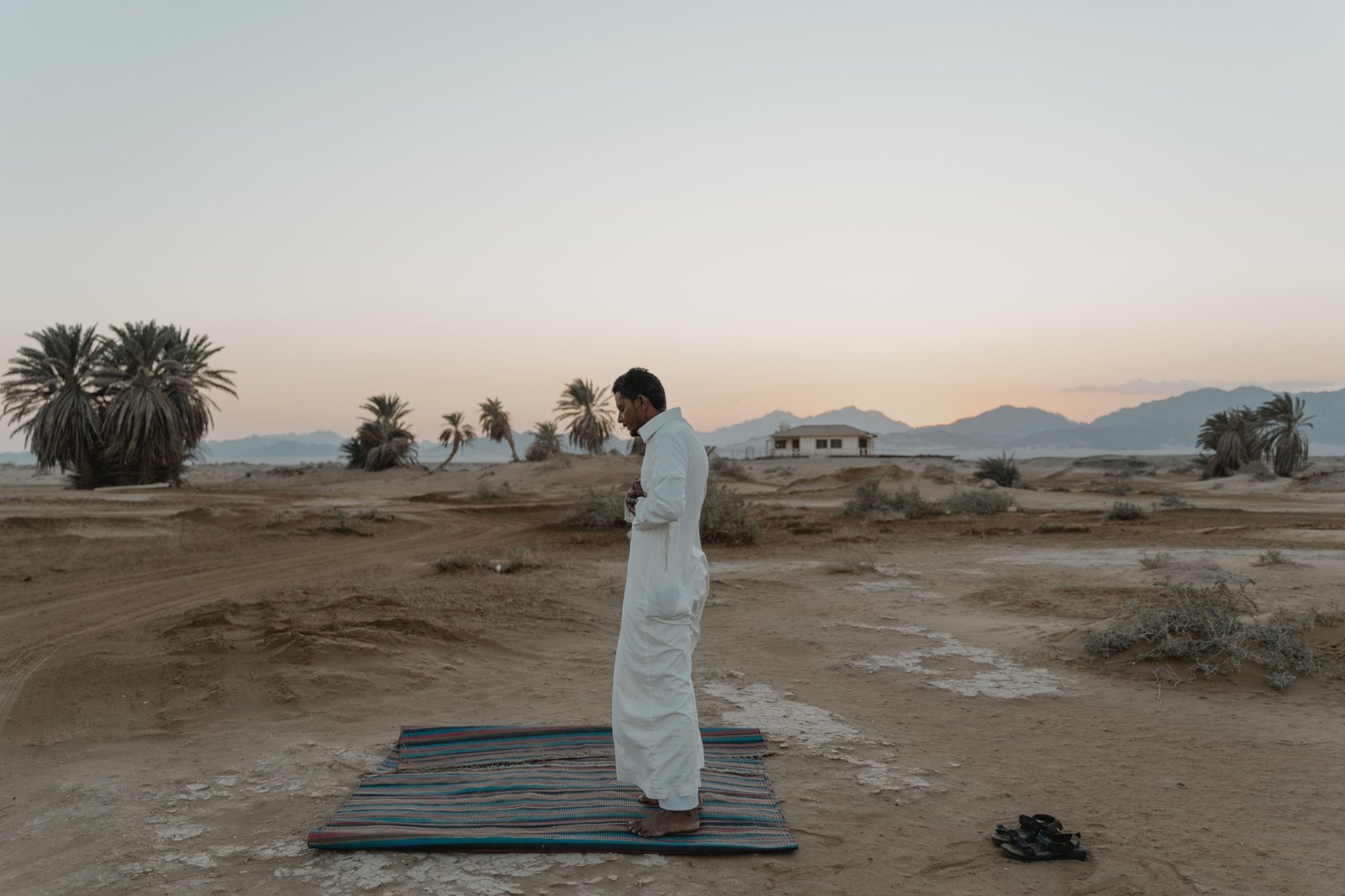 Portable travel prayer mat for Muslim prayer outdoors showing convenience and spiritual practice while traveling