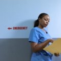 Travel nurse in scrubs ready for a short-term hospital assignment, symbolizing flexible and adventurous 4 week travel nurse jobs