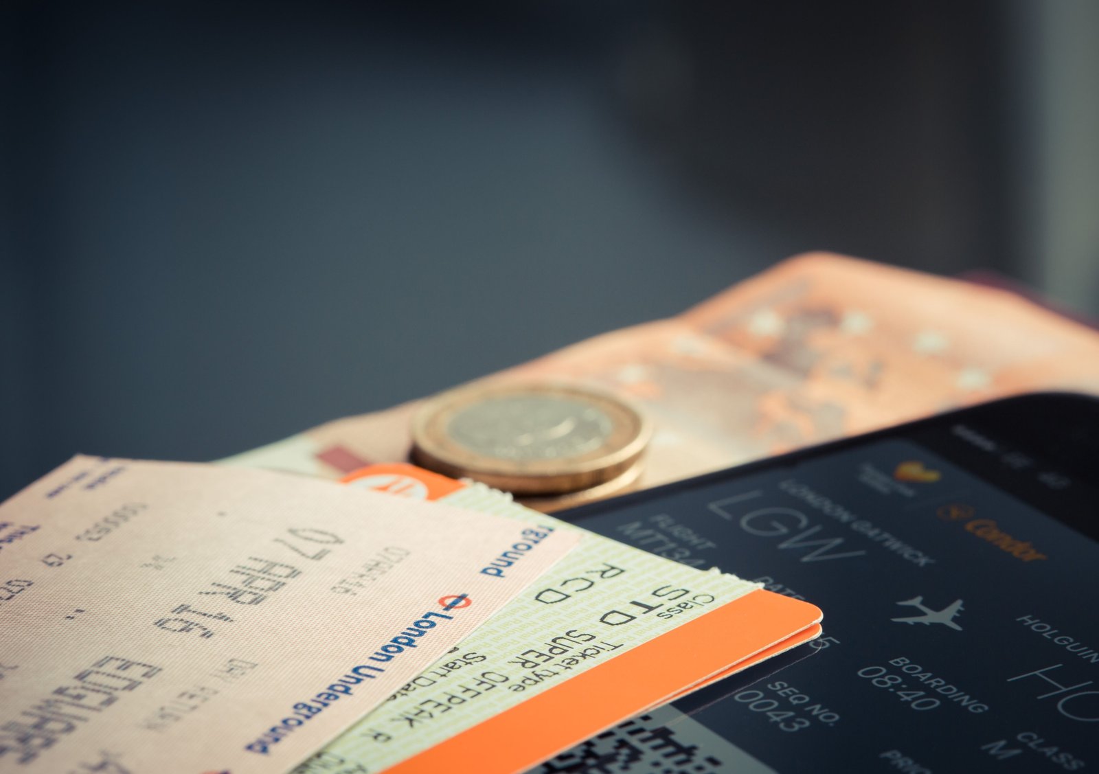 Traveler organizing and prioritizing flights, hotels, and car rentals on smartphone for seamless trip planning