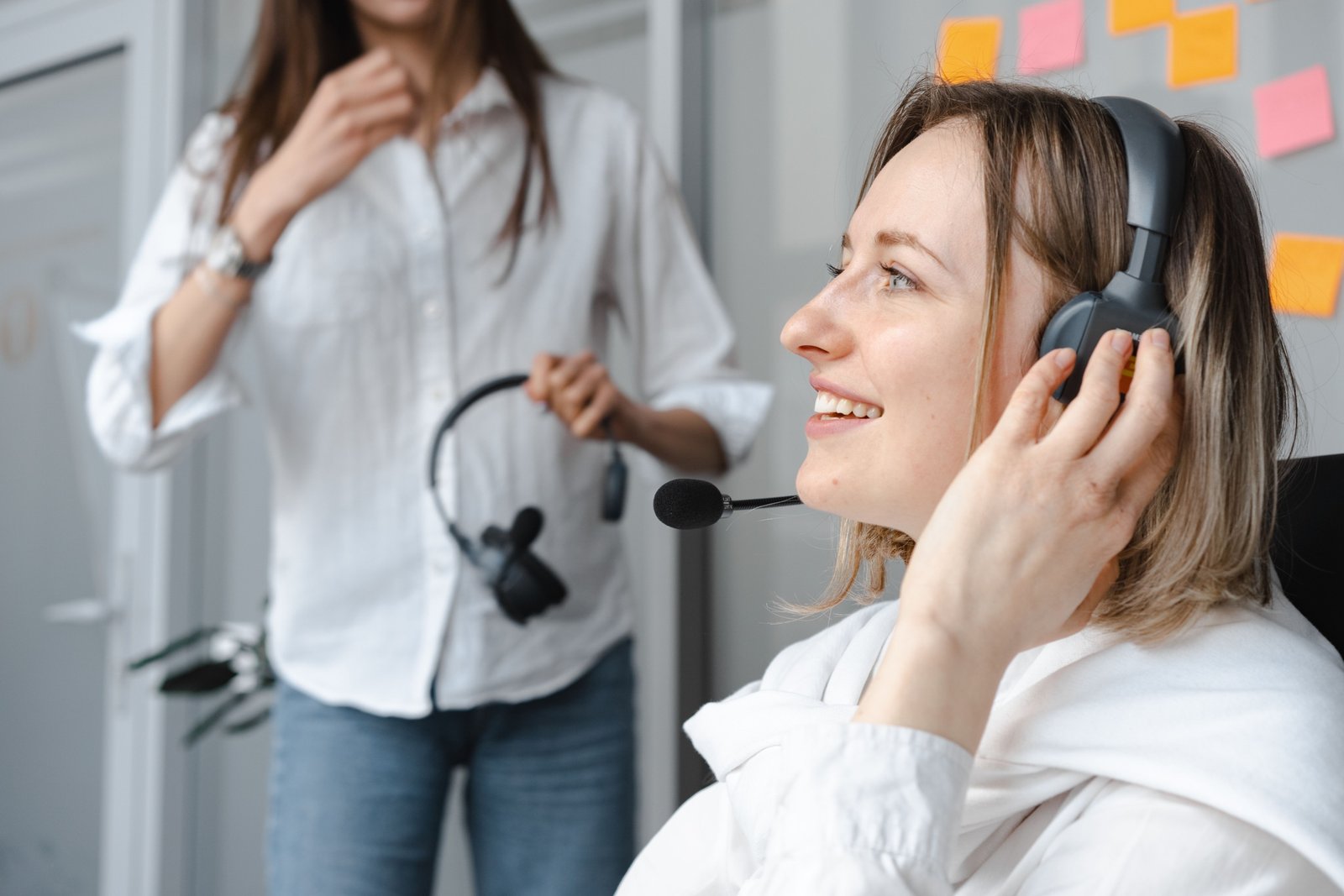 Travel agent providing personalized travel planning services to happy client for stress-free vacation
