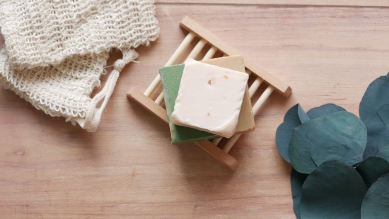 Eco friendly bamboo travel soap dish with natural soap bar for sustainable travel