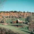 Scenic Vermont autumn landscape with colorful fall foliage and mountains during Columbus Day weekend