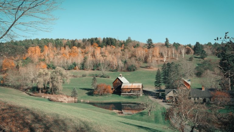 Scenic Vermont autumn landscape with colorful fall foliage and mountains during Columbus Day weekend