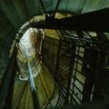 Close-up of durable elevator traveling cable inside elevator shaft demonstrating flexibility and safety features